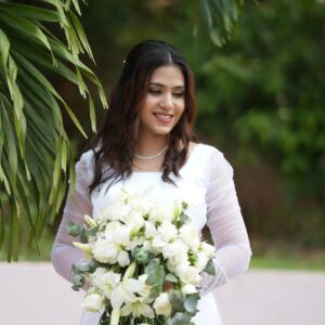 Best Bridal Makeup Artist in kerala with white bridal gown white
