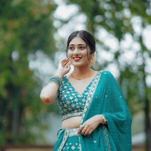 Best Bridal Makeup Artist in kerala with a blue lehanga girl