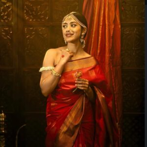 Best Bridal Makeup Artist in kerala with a red saree girl