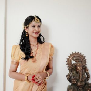 Best Bridal Makeup Artist in kerala with a cream saree girl