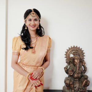 Best Bridal Makeup Artist in kerala with a cream saree girl